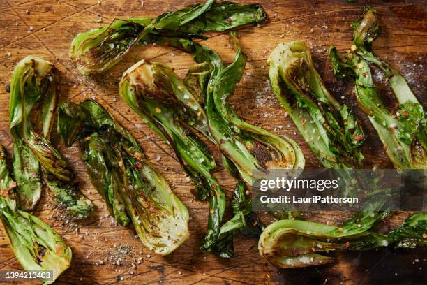 roasted baby bok choy - bok choy stock pictures, royalty-free photos & images