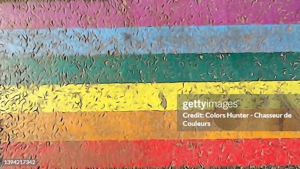 lgbt flag painted, weathered and textured with a comic book filter effect in paris - all love is equal fotos in paris stockfoto's en -beelden