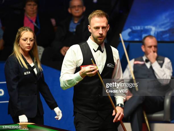 Judd Trump of England reacts during the semi-final match against Mark Williams of Wales on day 13 of the Betfred World Snooker Championships 2022 at...