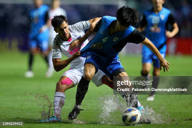 Kohei Kato of Chiangrai United controls the ball against Ruslan Mingazov of Kitchee SC during the first half of the AFC Champions League Group J...