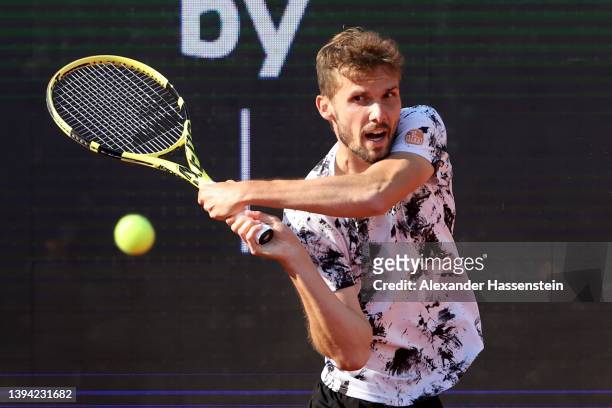 Oscar Otte of Germany plays a back hand during his 2nd round match against Reilly Opelka of USA on day six of the BMW Open by American Express at...