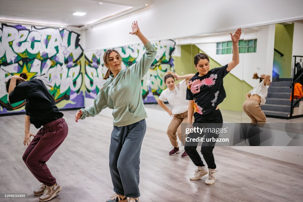Young Women Dancing Hip-hop In A Dance Studio