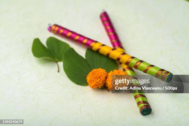 indian festival dussehra,showing golden leaf,high angle view of food on table - dandiya ストックフォトと画像