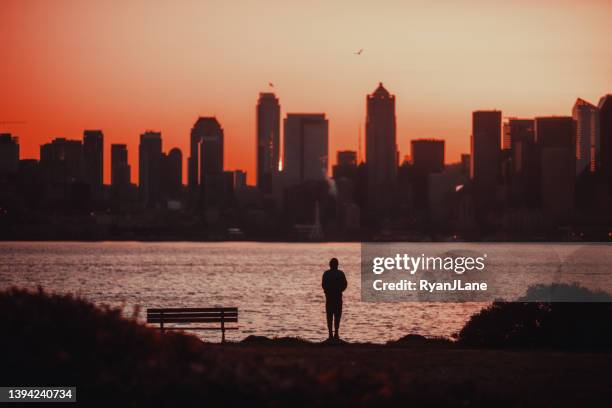 red sunrise in seattle washington - seattle landscape stock pictures, royalty-free photos & images