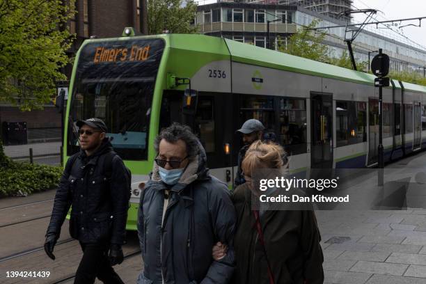 Tram makes its way through central town on April 28, 2022 in Croydon, England. The local elections in Croydon to determine all 70 ward council seats...