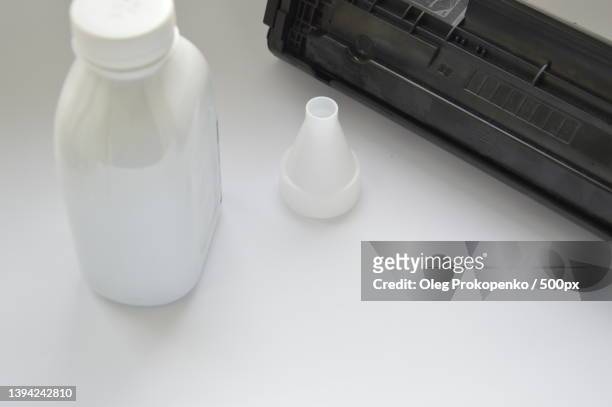 charging the laser printer cartridge with toner powder - oleg prokopenko stock pictures, royalty-free photos & images