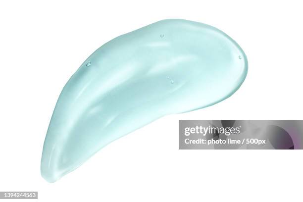 hyaluronic acid serum blob smear,a close-up beauty image of a sample of moisturizer on white background - saliva bodily fluid stock pictures, royalty-free photos & images