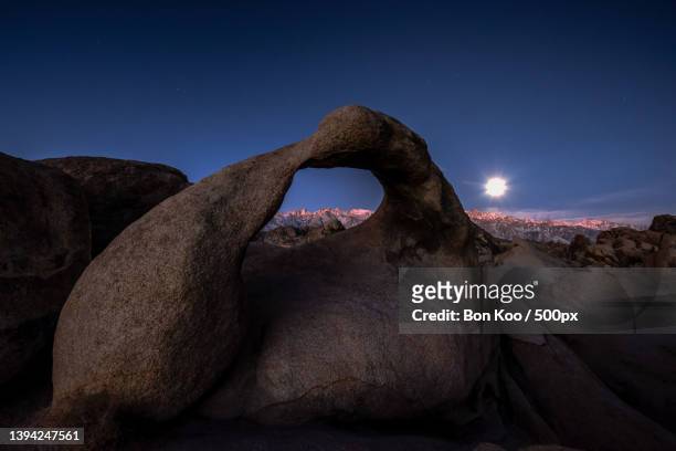 view of rock formation against sky at night,alabama hills,united states,usa - alabama hills stock-fotos und bilder