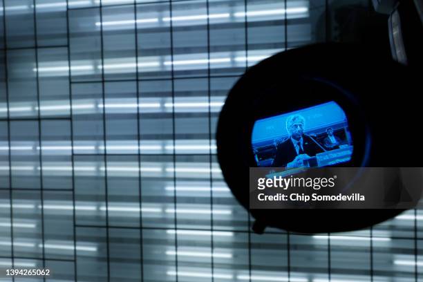 Secretary of State Antony Blinken is seen through a television viewfinder as he testifies before the House Foreign Affairs Committee about the FY2023...
