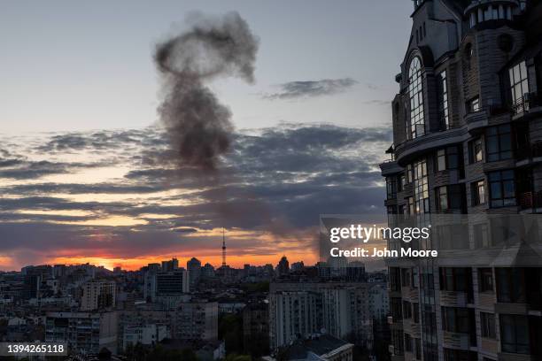 Smoke rises after missiles landed at sunset on April 28, 2022 in Kyiv, Ukraine. The mayor of Kyiv, Vitali Klitschko, said on his Telegram account...