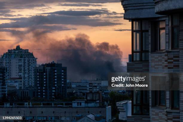 Smoke rises after missiles landed at sunset on April 28, 2022 in Kyiv, Ukraine. The mayor of Kyiv, Vitali Klitschko, said on his Telegram account...
