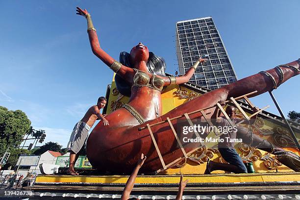 Brazilians prepare a float during Carnival celebrations on February 20, 2012 in Rio de Janeiro, Brazil. Carnival is the grandest holiday in Brazil,...