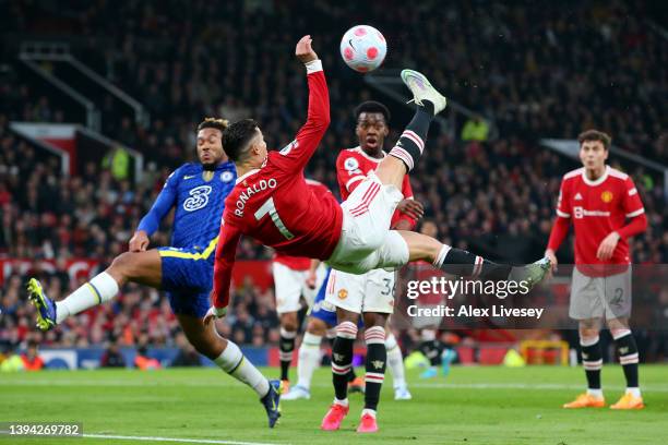Cristiano Ronaldo of Manchester United shoots acrobatically during the Premier League match between Manchester United and Chelsea at Old Trafford on...