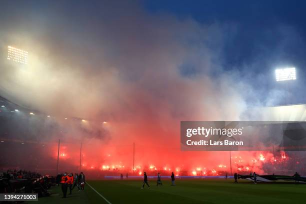 Fans of Marseille and Feyenoord light flares in the stands prior to the UEFA Conference League Semi Final Leg One match between Feyenoord and...