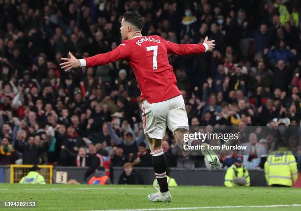 Cristiano Ronaldo of Manchester United celebrates scoring their first goal during the Premier League match between Manchester United and Chelsea at...