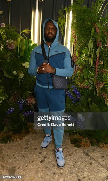 Headie One at the launch of Monkey 47 and *A BATHING APE® capsule collection at the BAPE flagship store in London, England.