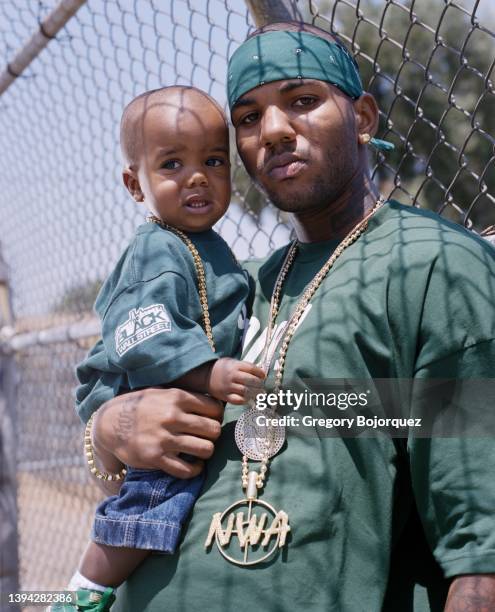 Rapper The Game and his son in July, 2004 in Compton, California.