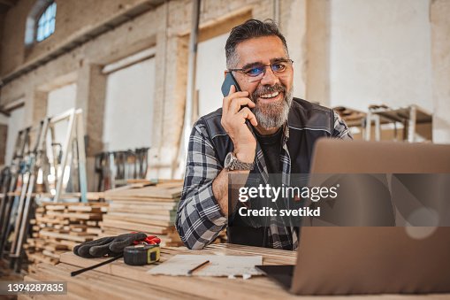 Carpenter in wood workshop Carpenter in wood workshop