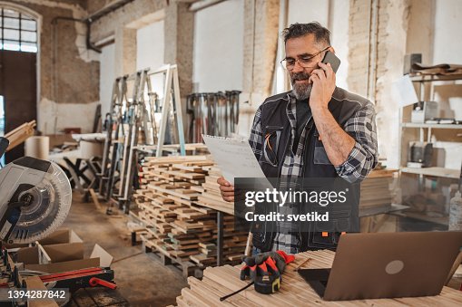 Carpenter in wood workshop Carpenter in wood workshop