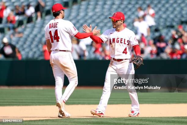 Tyler Wade and Andrew Velazquez of the Los Angeles Angels celebrate their 4-1 win against the Cleveland Guardians at Angel Stadium of Anaheim on...