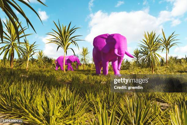 surreal pink elephant walking fantasy jungle - pink elephant stock pictures, royalty-free photos & images