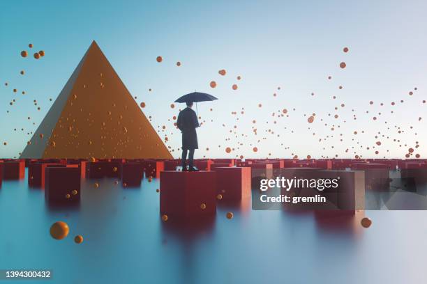 surreal image of businessman standing in fantasy landscape - thinking fantasy stock pictures, royalty-free photos & images