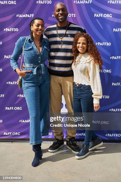 American former professional basketball player, talk show host and actor, John Salley with his wife Natasha Duffy and daughter Taya Salley attend the...