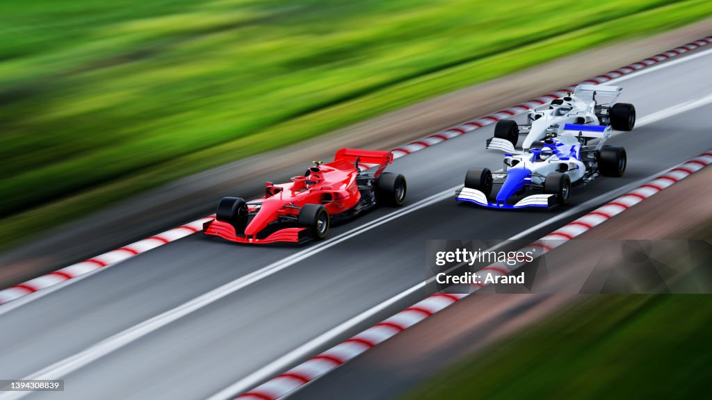 Red Racing Car On Track Red Race Car Leading On A Race Track High-Res Stock Photo - Getty Images