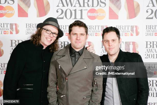Greg Churchouse, Roy Stride and Peter Ellard of Scouting For Girls attend the red carpet during The BRIT Awards 2011 at The O2 on February 15, 2011...