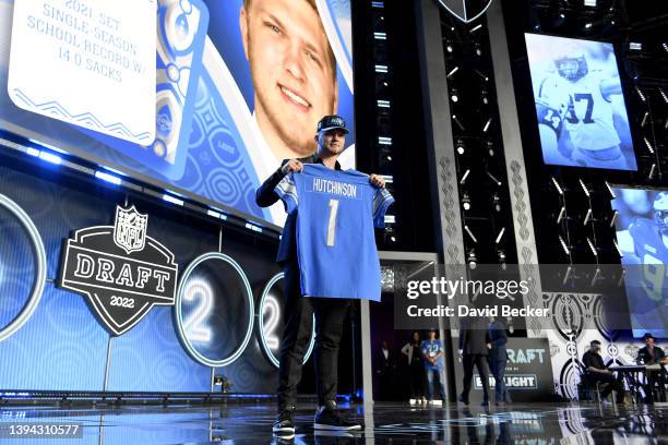 Aidan Hutchinson poses onstage after being selected second by the Detroit Lions during round one of the 2022 NFL Draft on April 28, 2022 in Las...