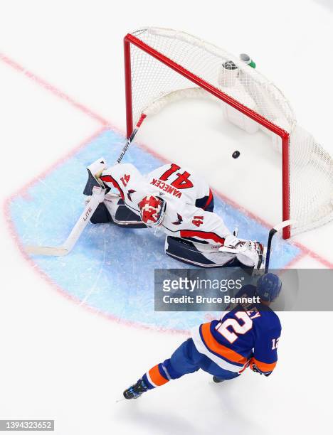 Josh Bailey of the New York Islanders scores a third period goal against Vitek Vanecek of the Washington Capitals at UBS Arena on April 28, 2022 in...