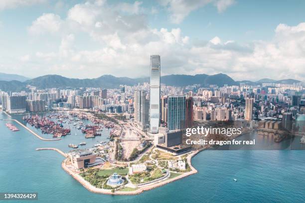 skyscrapers in kowloon station - building top stock pictures, royalty-free photos & images