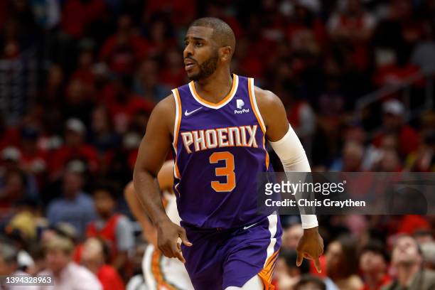 Chris Paul of the Phoenix Suns drives the ball against the New Orleans Pelicans at Smoothie King Center on April 28, 2022 in New Orleans, Louisiana....