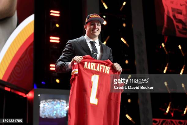 George Karlaftis poses onstage after being selected 30th by the Kansas City Chiefs during round one of the 2022 NFL Draft on April 28, 2022 in Las...
