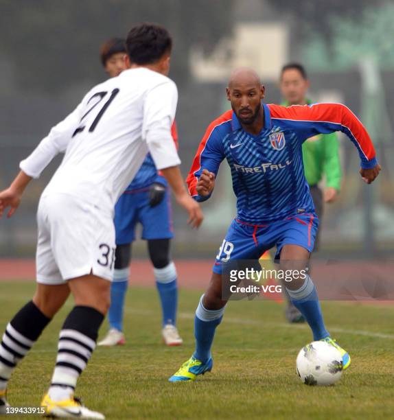 French football player Nicolas Anelka of Shanghai Shenhua in action during a warm-up match between Shanghai Shenhua and Hunan Xiangtao at Shenhua...