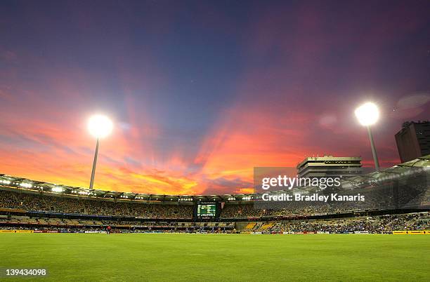 The sun sets behind the Gabba stadium during game eight of the One Day International Series between India and Sri Lanka at The Gabba on February 21,...