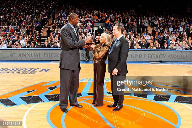 The fourth annual Dick McGuire Knickerbocker Legacy Award is presented to New York Knicks Assistant Coach Herb Williams, left, during the game...