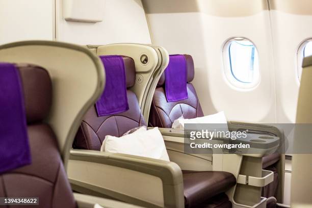business class aircraft seat - economy class stock-fotos und bilder
