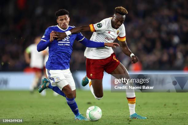 James Justin of Leicester City battles for possession with Tammy Abraham of AS Roma during the UEFA Conference League Semi Final Leg One match...