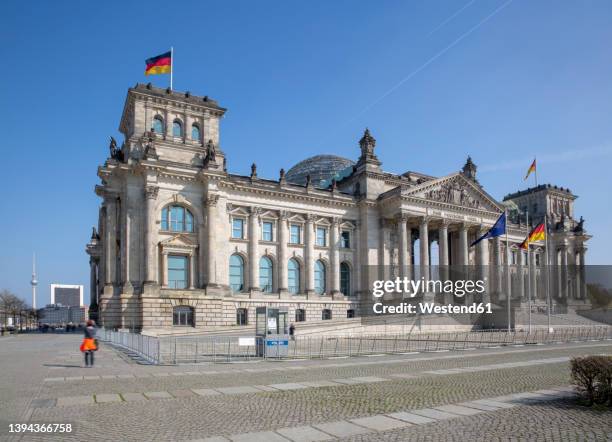 germany, berlin, exterior of reichstag building - reichstag stock-fotos und bilder