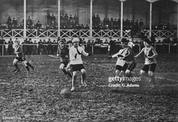 Soccer players in action during soccer match between French teams En Avant! and Academia, Paris, France, 11th february 1920.