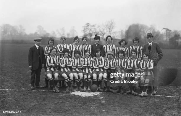 Players of the Ediswan Ladies Football Club staff team of the Edison and Swan Electric Light Company at a match in Edmonton, UK, 8th January 1921.