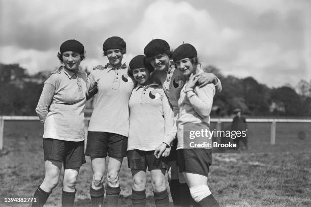 Players of the French women's soccer team at a training session before their first international match against Dick, Kerr Ladies F.C, representing...