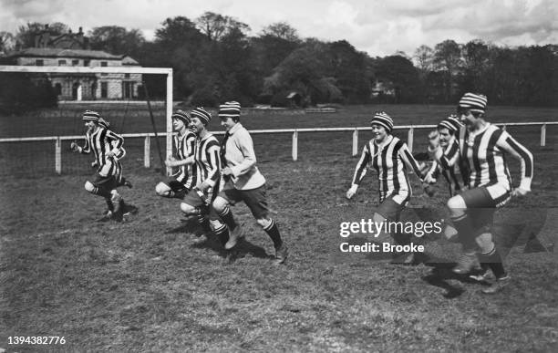 Players of team Dick, Kerr Ladies F.C representing England at a training session before an international match against the French women's soccer...