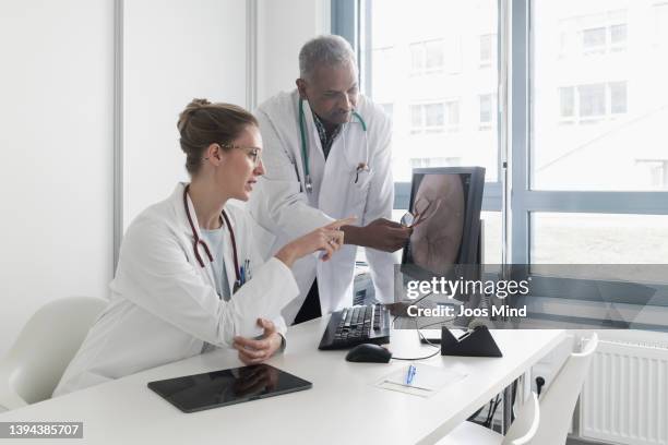 Male Gp Using Computer Photos and Premium High Res Pictures - Getty Images