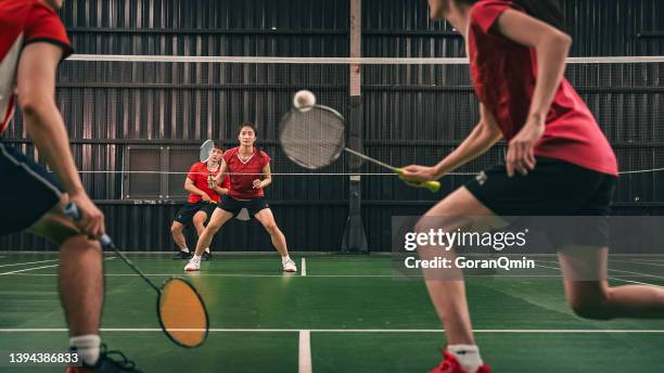《badminton spirit》defensive to offensive - badminton smash stock pictures, royalty-free photos & images