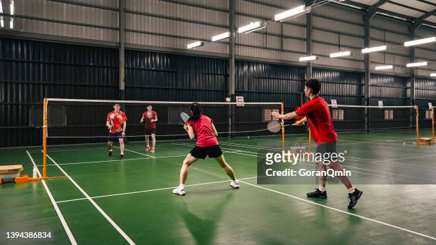 《badminton spirit》flat service - badminton sport stockfoto's en -beelden