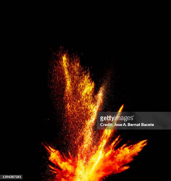 fire and smoke from an explosion on a black background. - shooting a weapon stock pictures, royalty-free photos & images