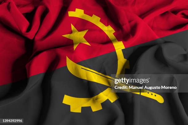 flag of angola - civil war angola stock pictures, royalty-free photos & images