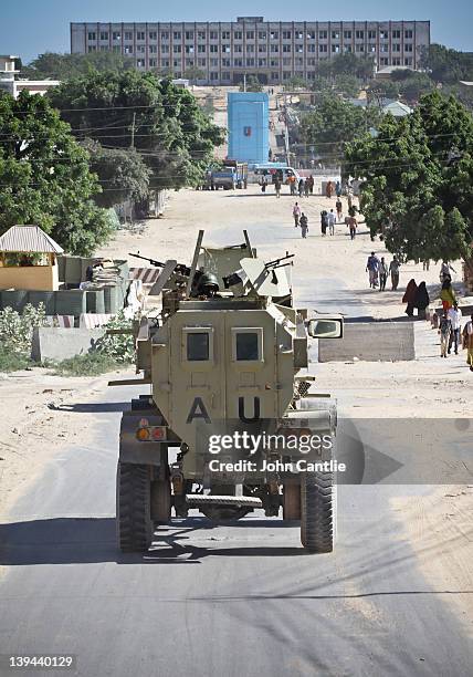 An AMISOM armoured vehicle patrols the K4 district of town on February 20, 2012 in Mogadishu, Somalia. As operations against Al Shabaab continue,...